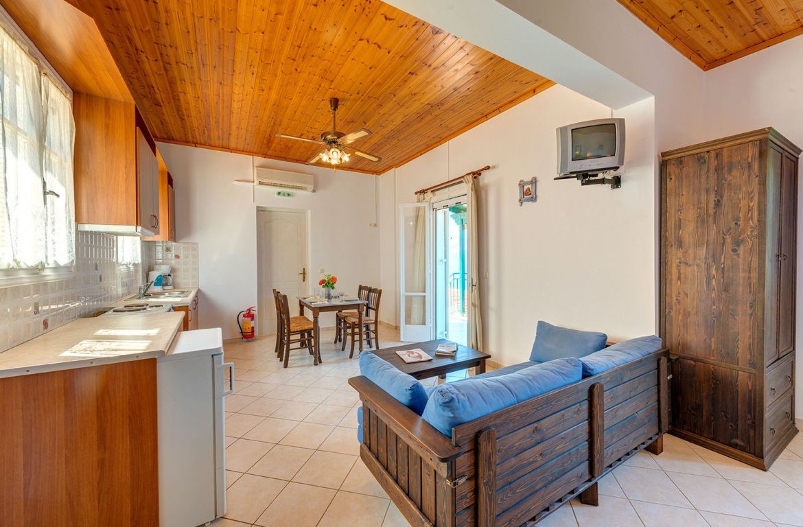 Kitchen and living area of cottage for sale in Ithaca Greece, Stavros
