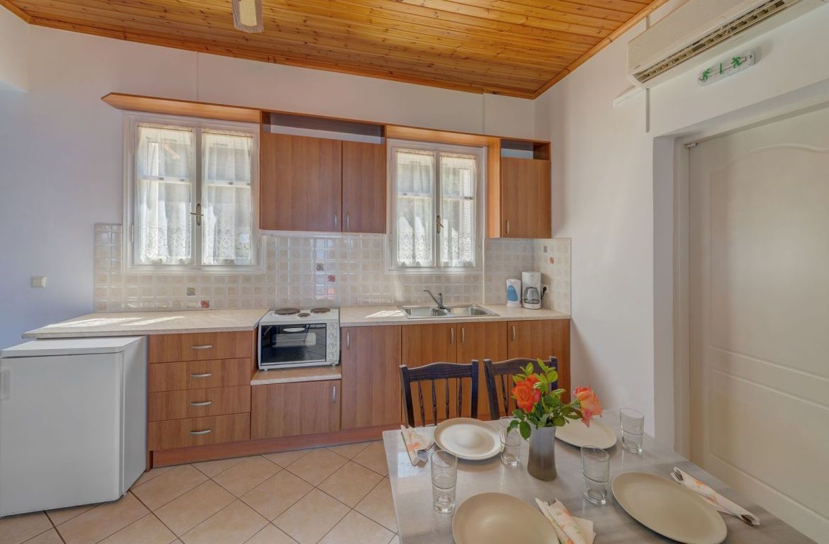 Kitchen and dining area of cottages for sale in Ithaca Greece, Stavros