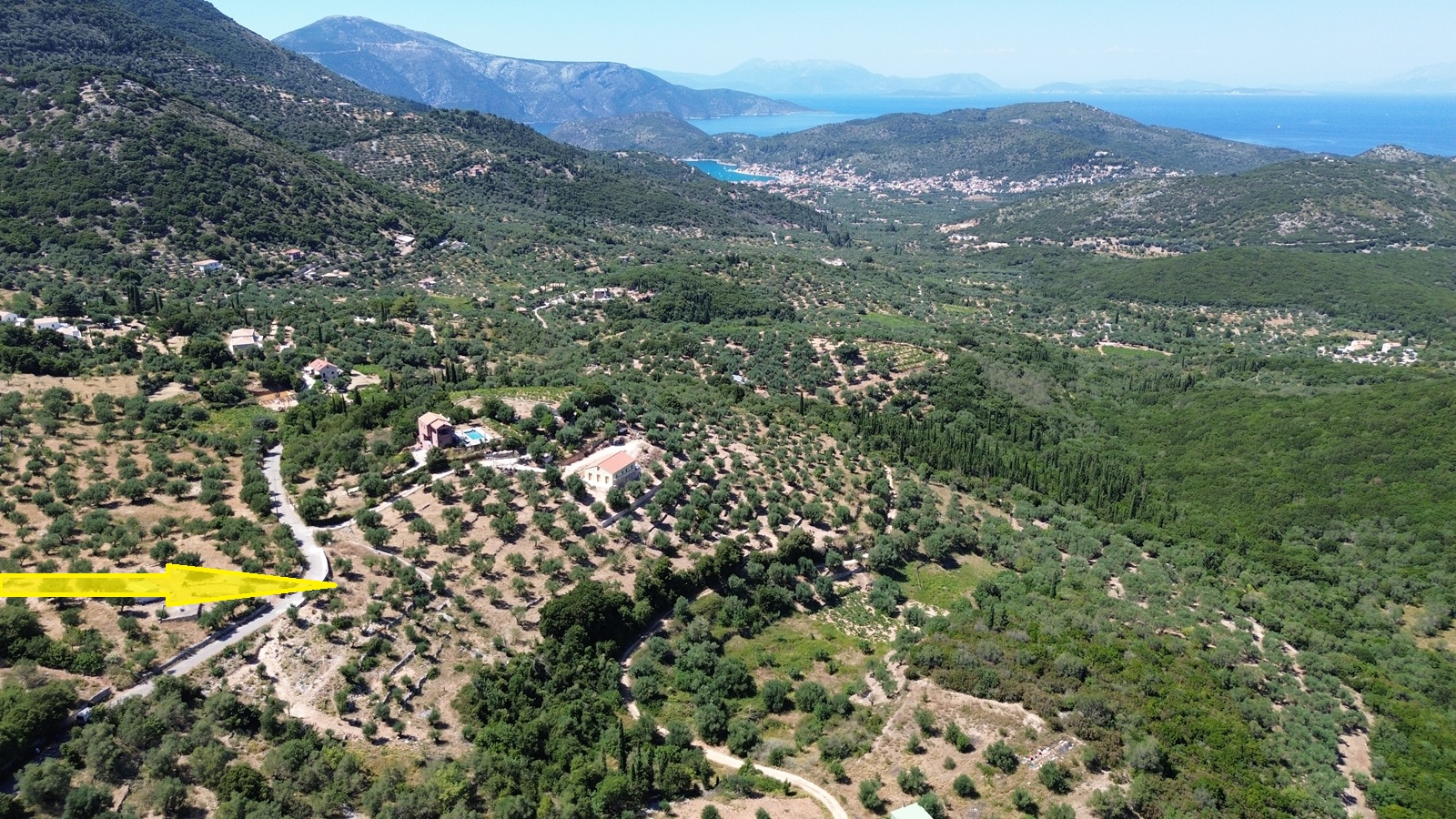 Aerial view and location of land with building license for sale in Ithaca Greece, Vathi