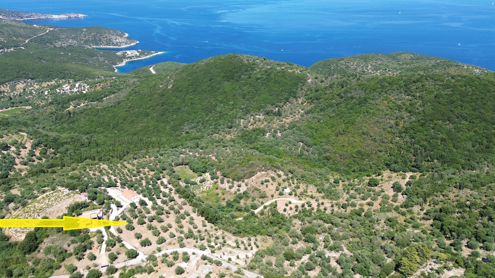 Aerial view and location of land with building license for sale in Ithaca Greece, Vathi