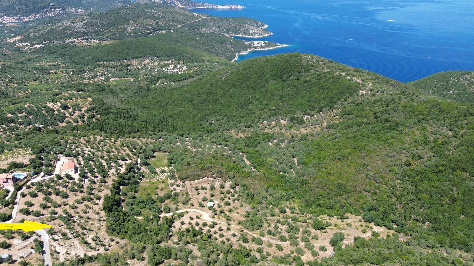 Aerial view and location of land with building license for sale in Ithaca Greece, Vathi