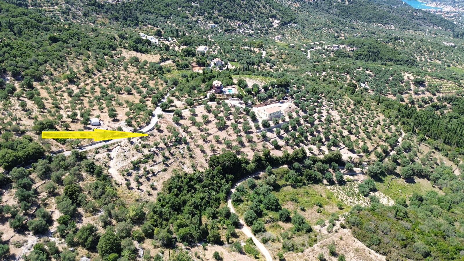 Aerial view and location of land with building license for sale in Ithaca Greece, Vathi