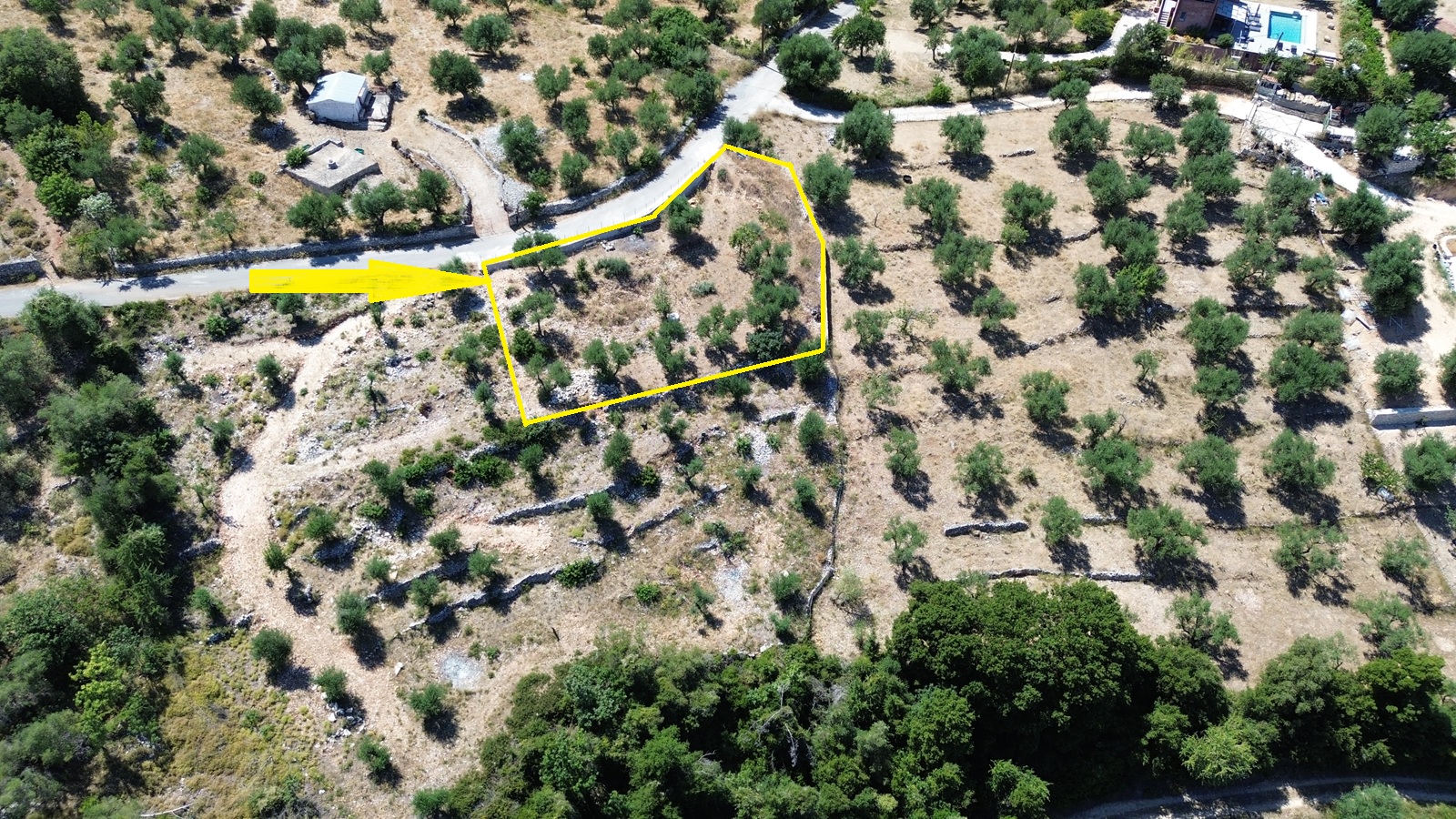 Aerial view and border of land with building license for sale in Ithaca Greece, Vathi