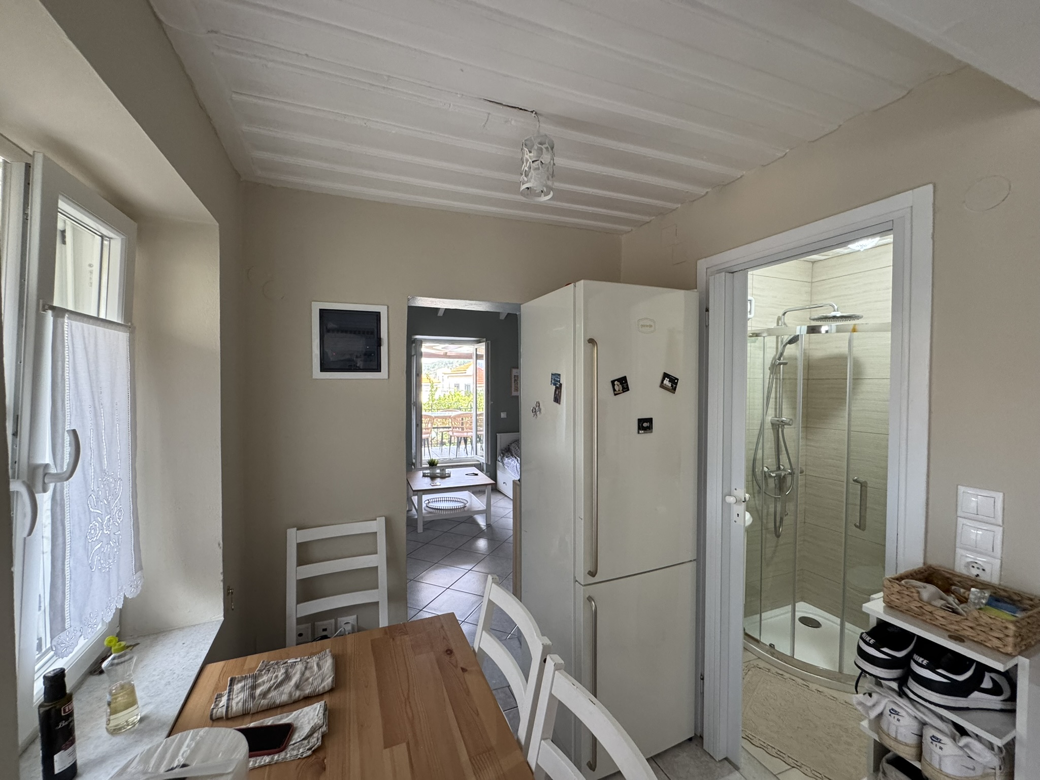 Dining area and bathroom of house for sale in Ithaca Greece, Vathi