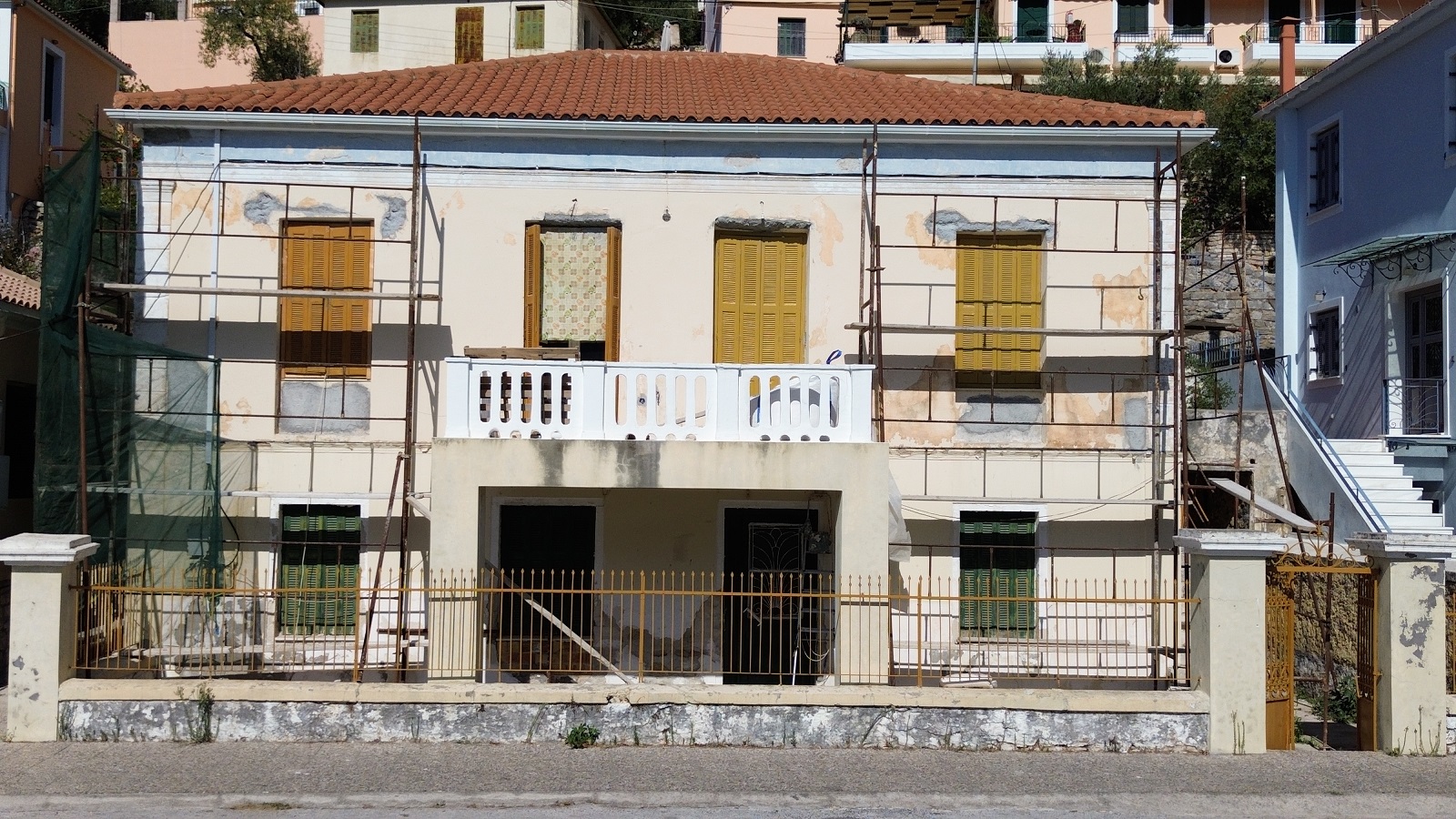 Road view of house for sale in Ithaca Greece, Vathi