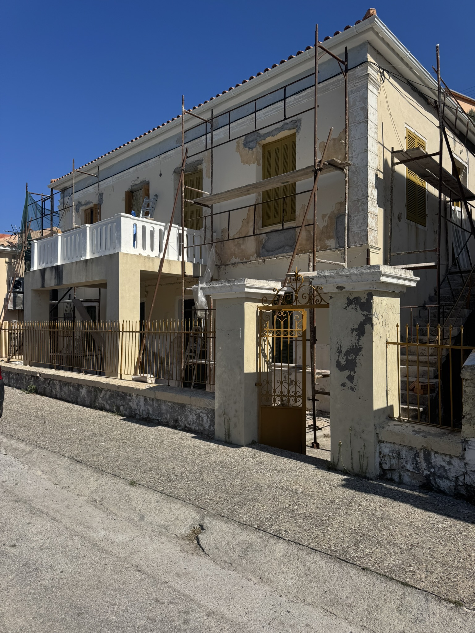 Road view of house for sale in Ithaca Greece, Vathi