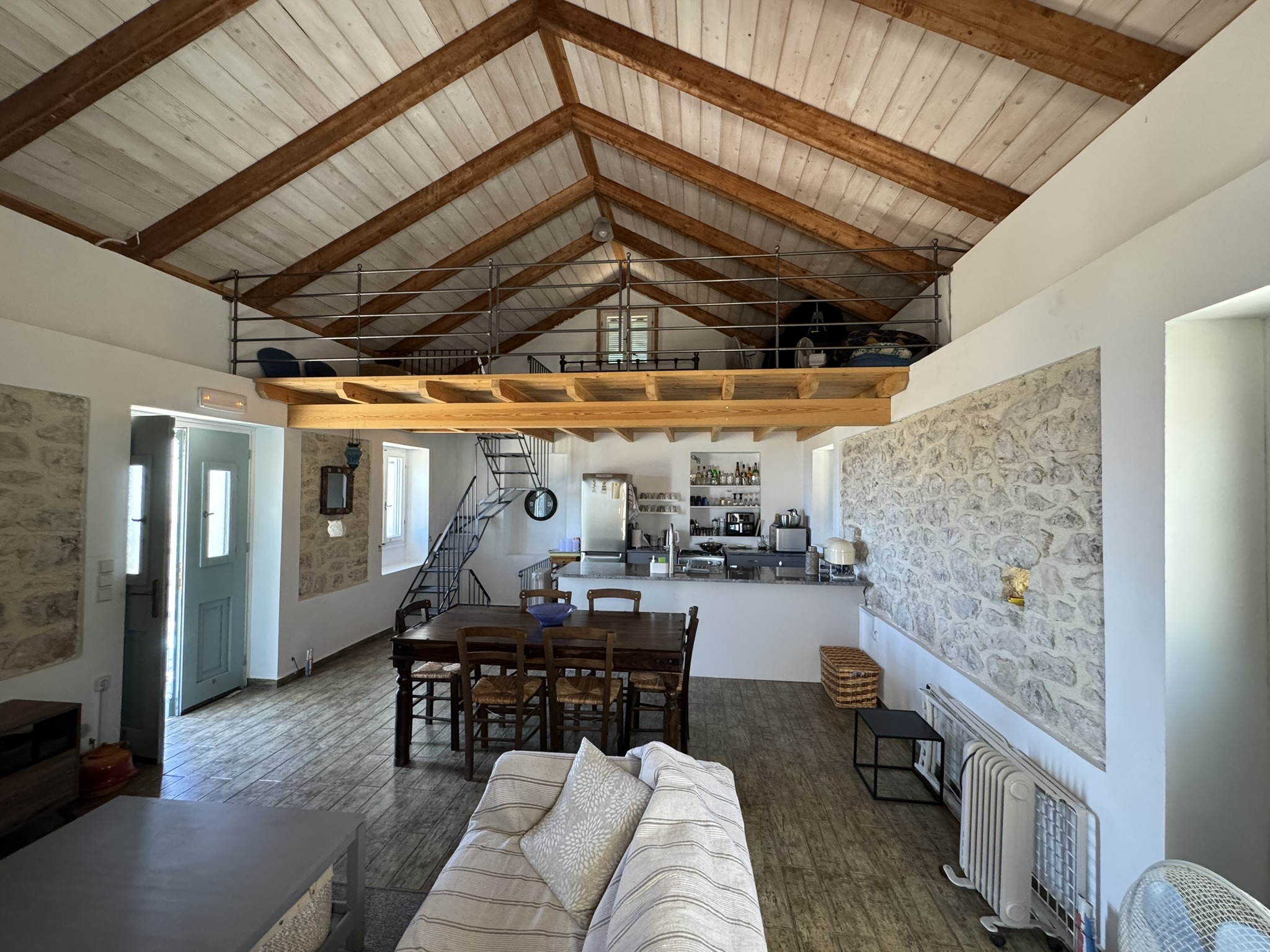 Open plan living and loft of house for sale in Ithaca Greece, Anoghi