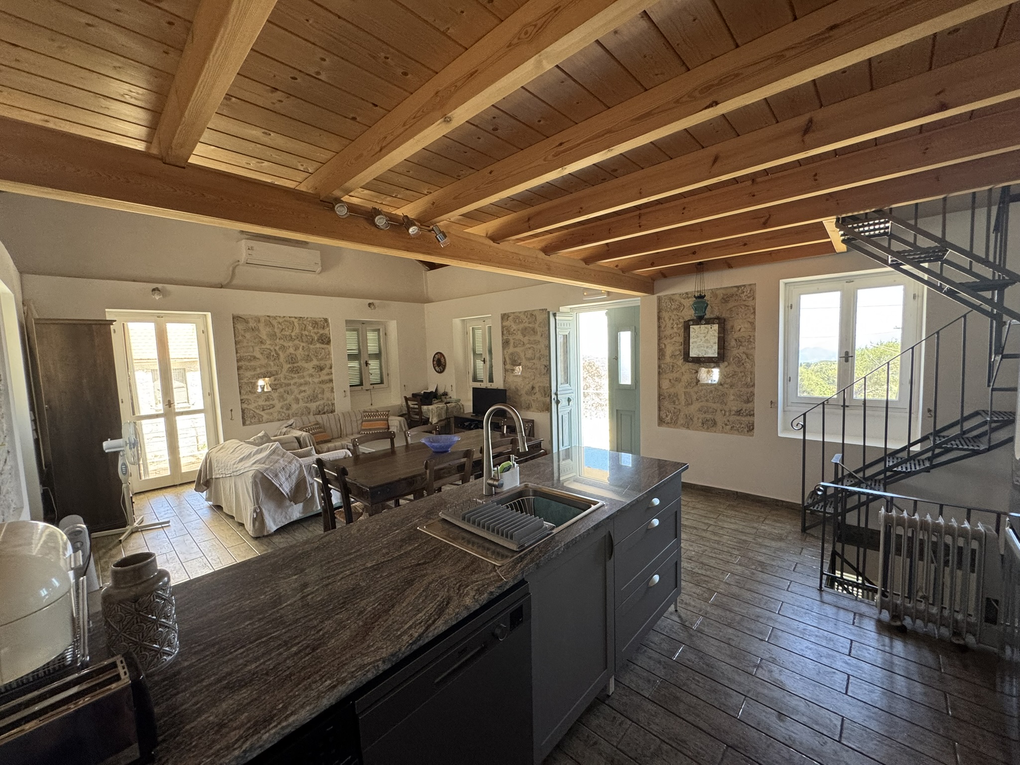Kitchen and living area of house for sale in Ithaca Greece, Anoghi