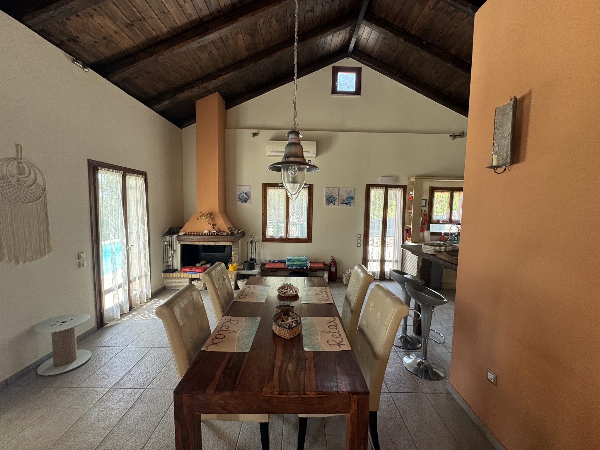 Dining and living area of house for sale in Ithaca Greece, Lefki