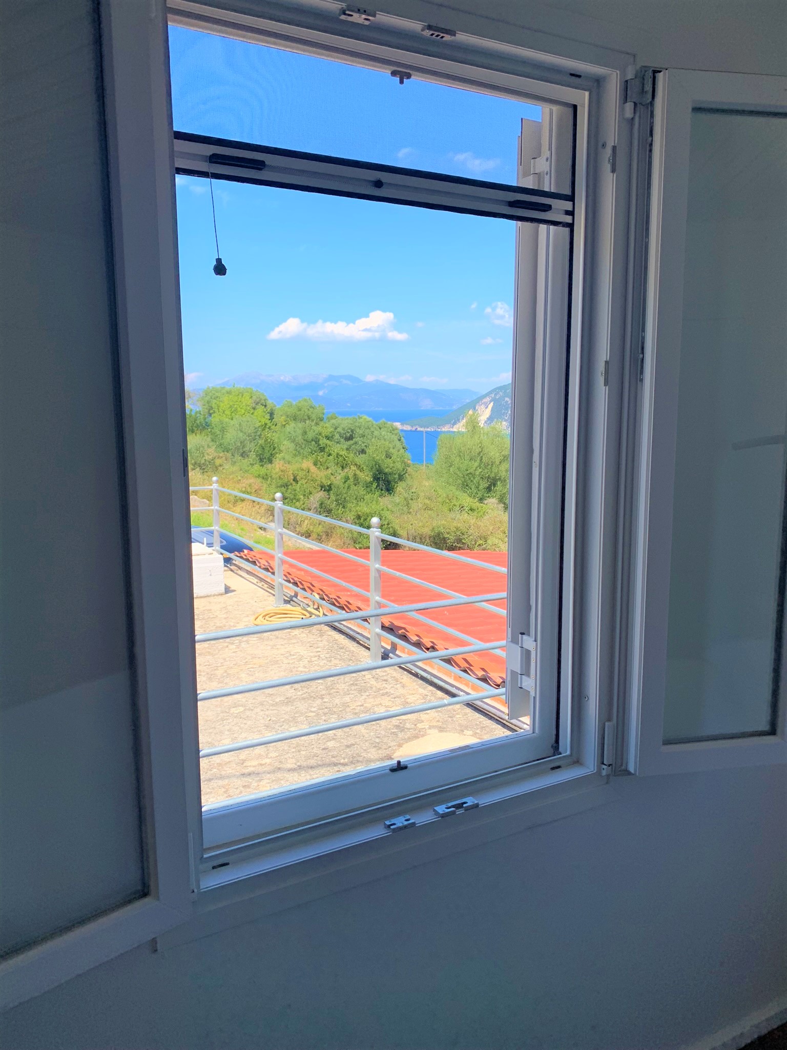 Window views of house for sale in Ithaca Greece, Platrithyas