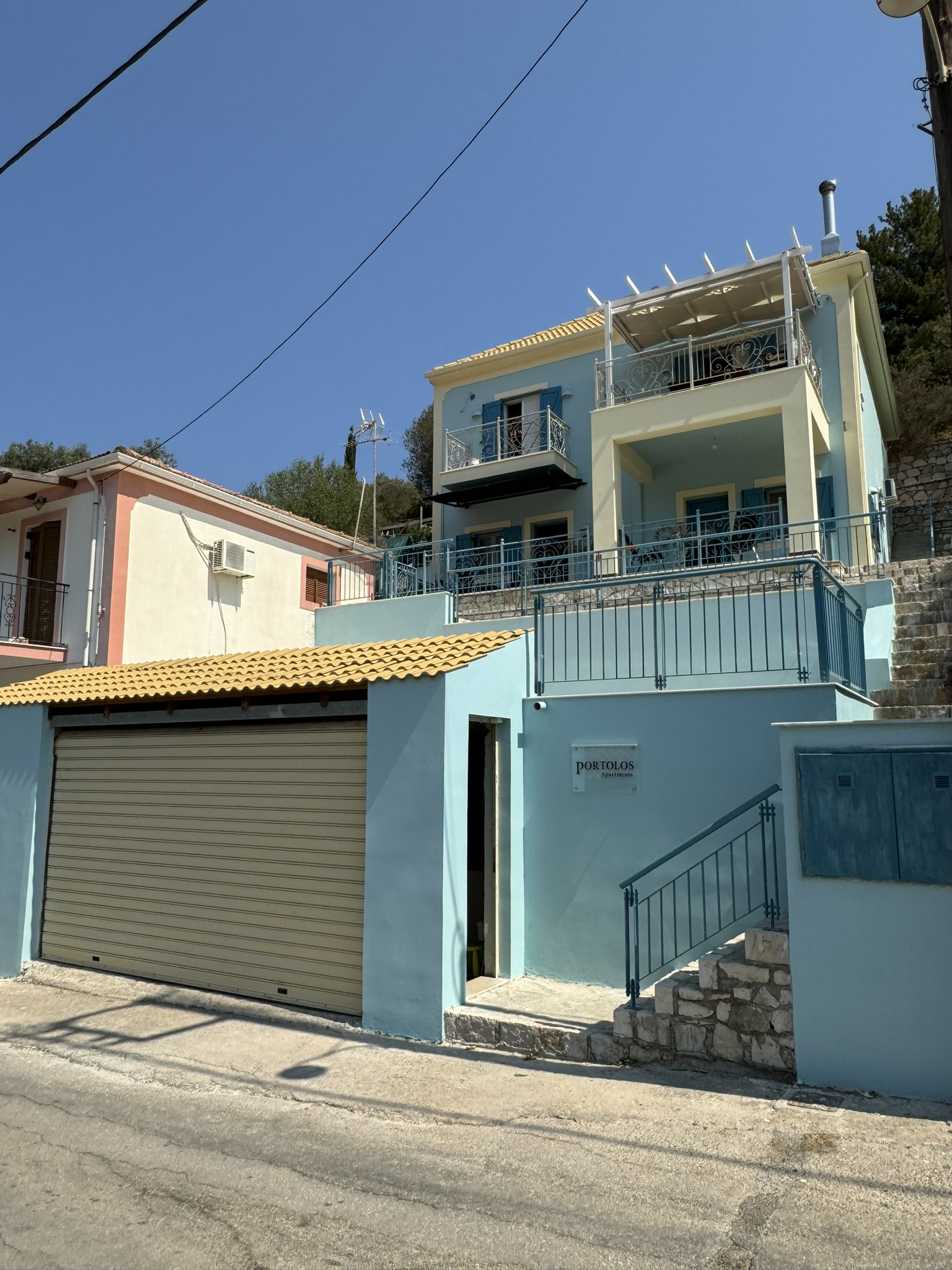 Road view of house for sale in Ithaca Greece, Vathi