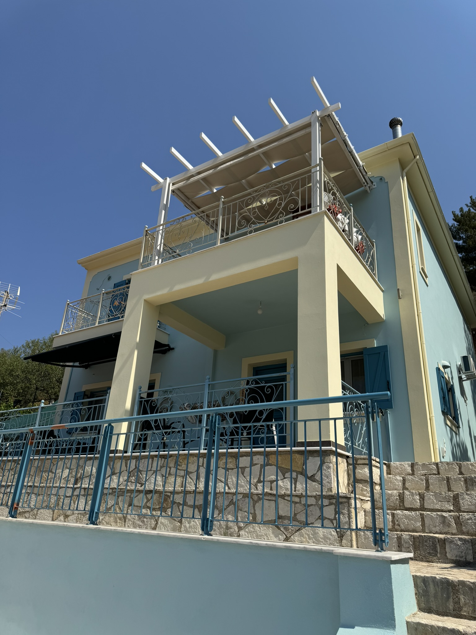 Road view of house for sale in Ithaca Greece, Vathi