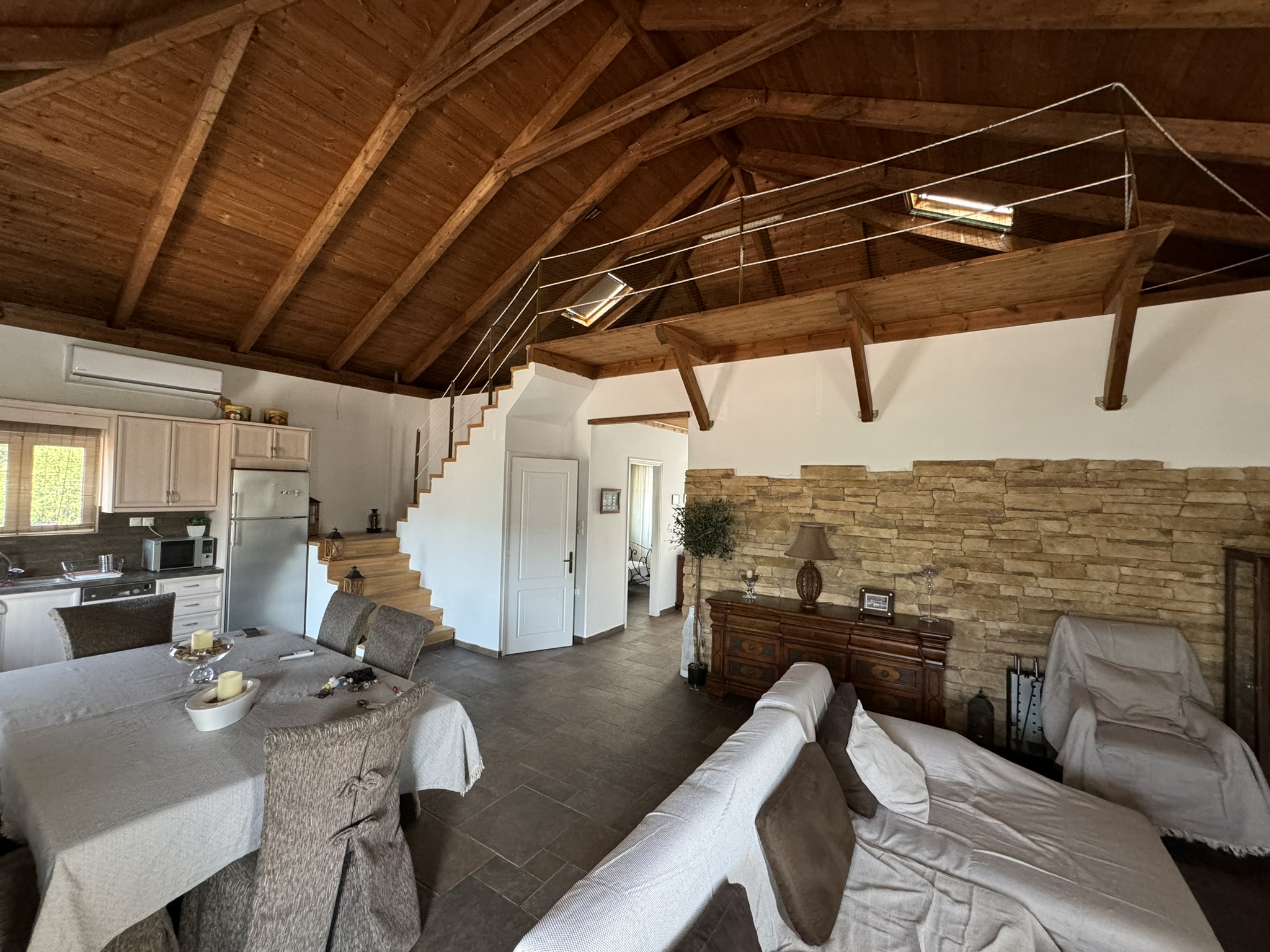 Kitchen and living area of house for sale in Ithaca Greece, Vathi