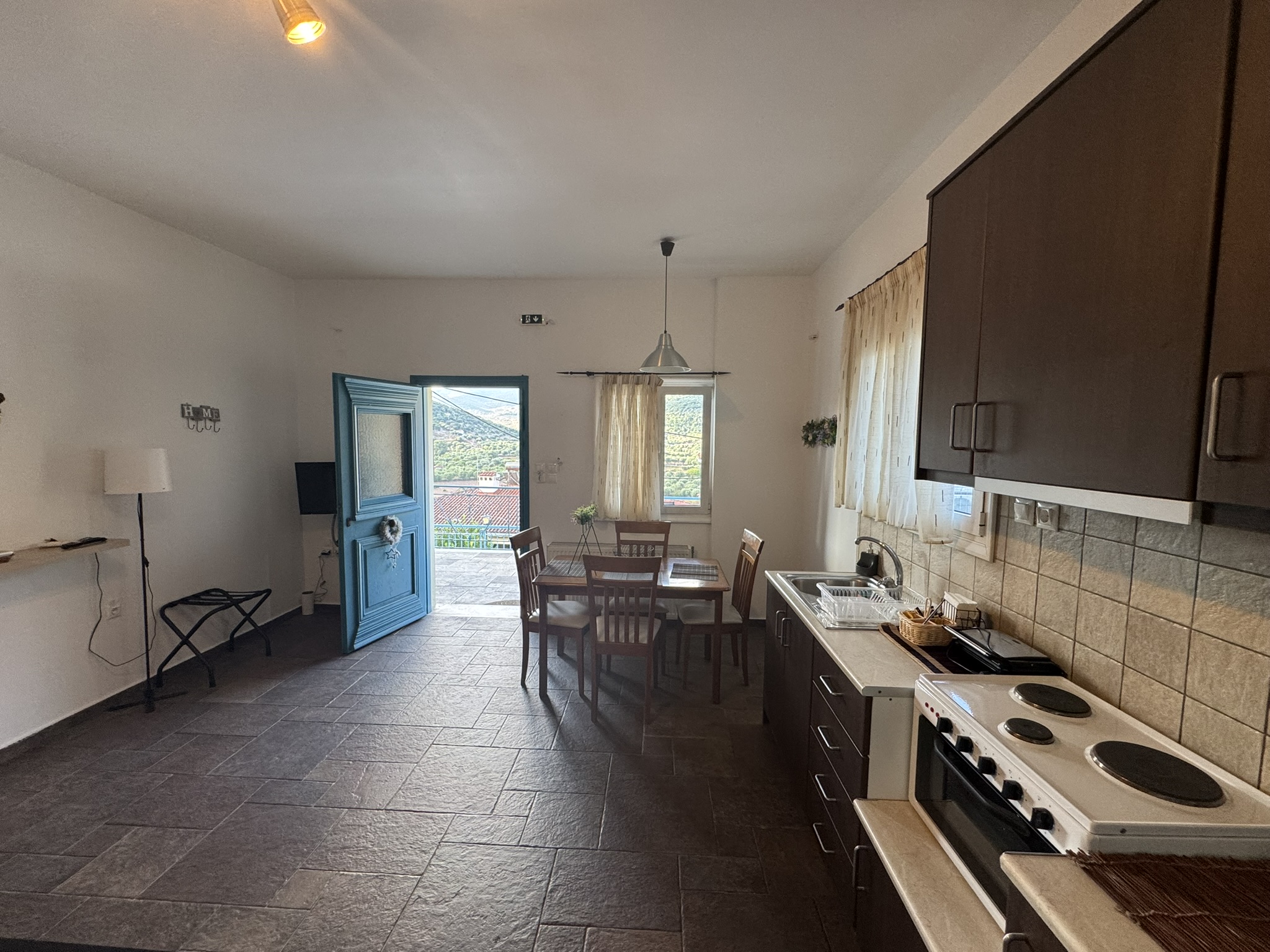 Kitchen in downstairs apartment of house for sale in Ithaca Greece, Vathi