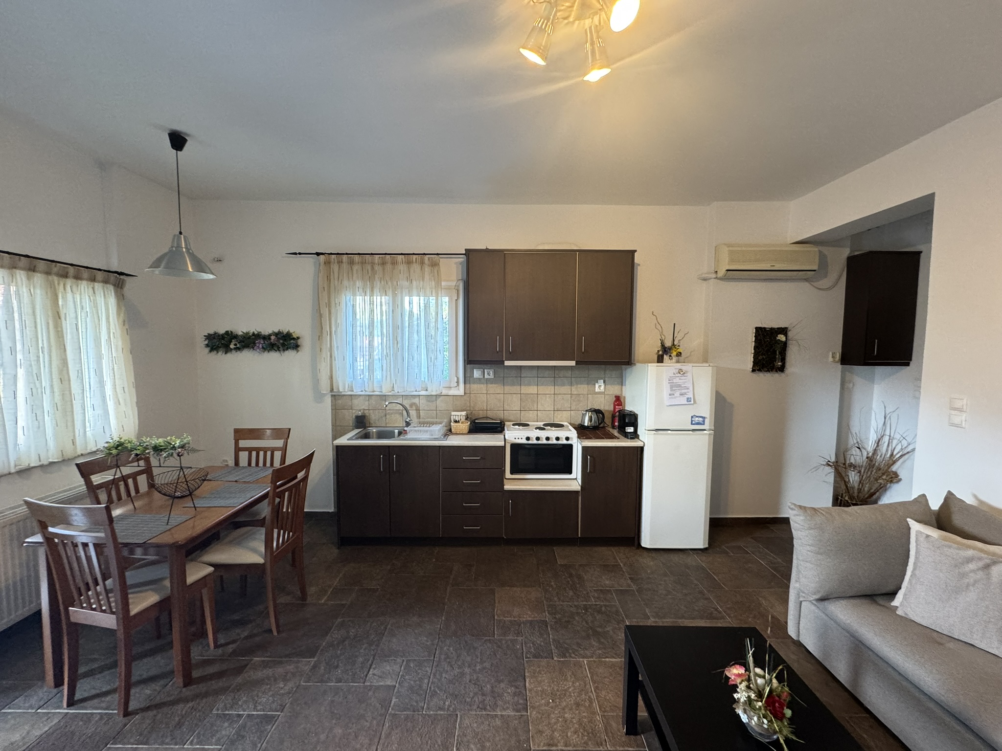 Kitchen in downstairs apartment of house for sale in Ithaca Greece, Vathi