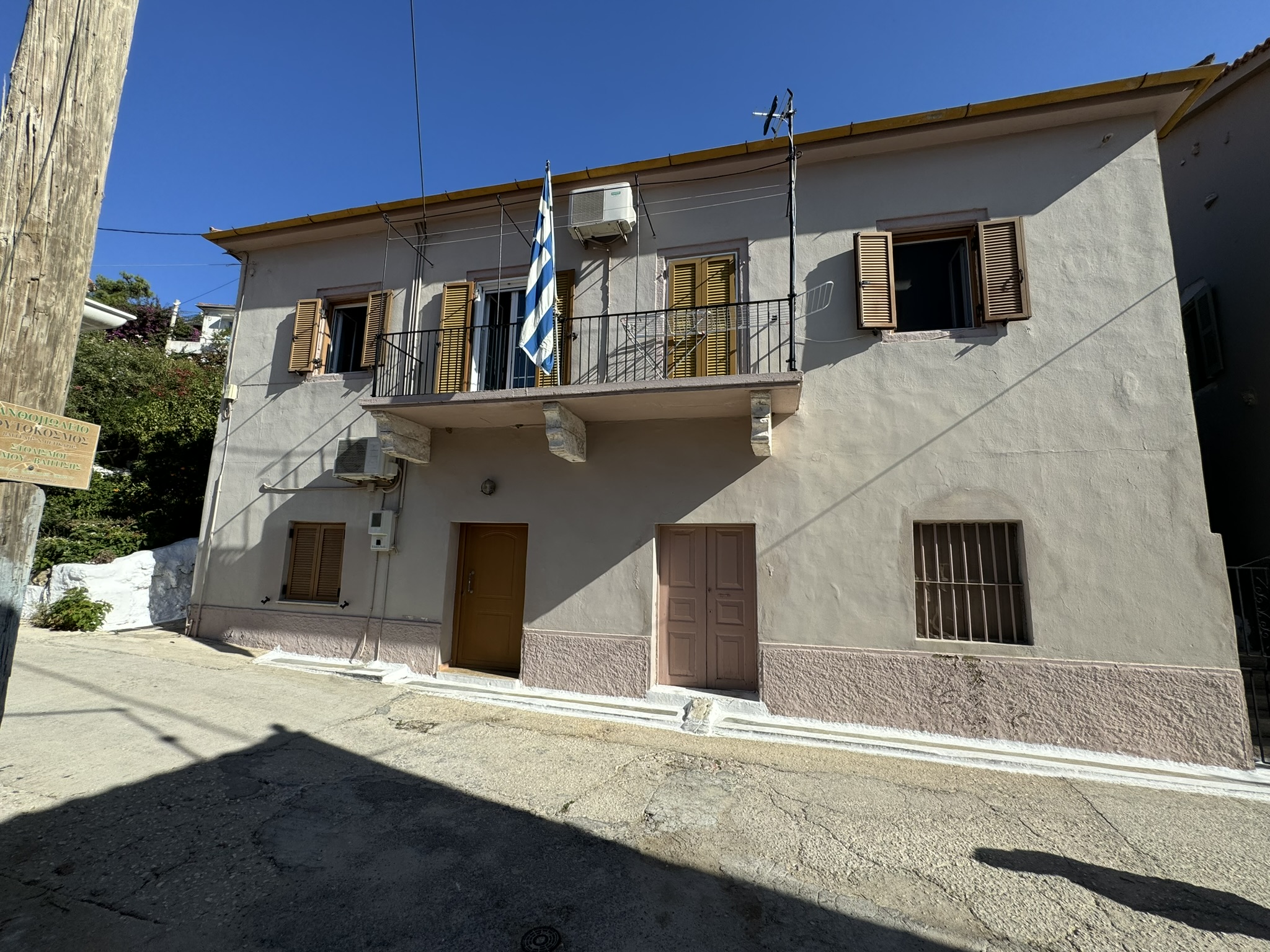 Road view of house for sale in Ithaca Greece, Vathi