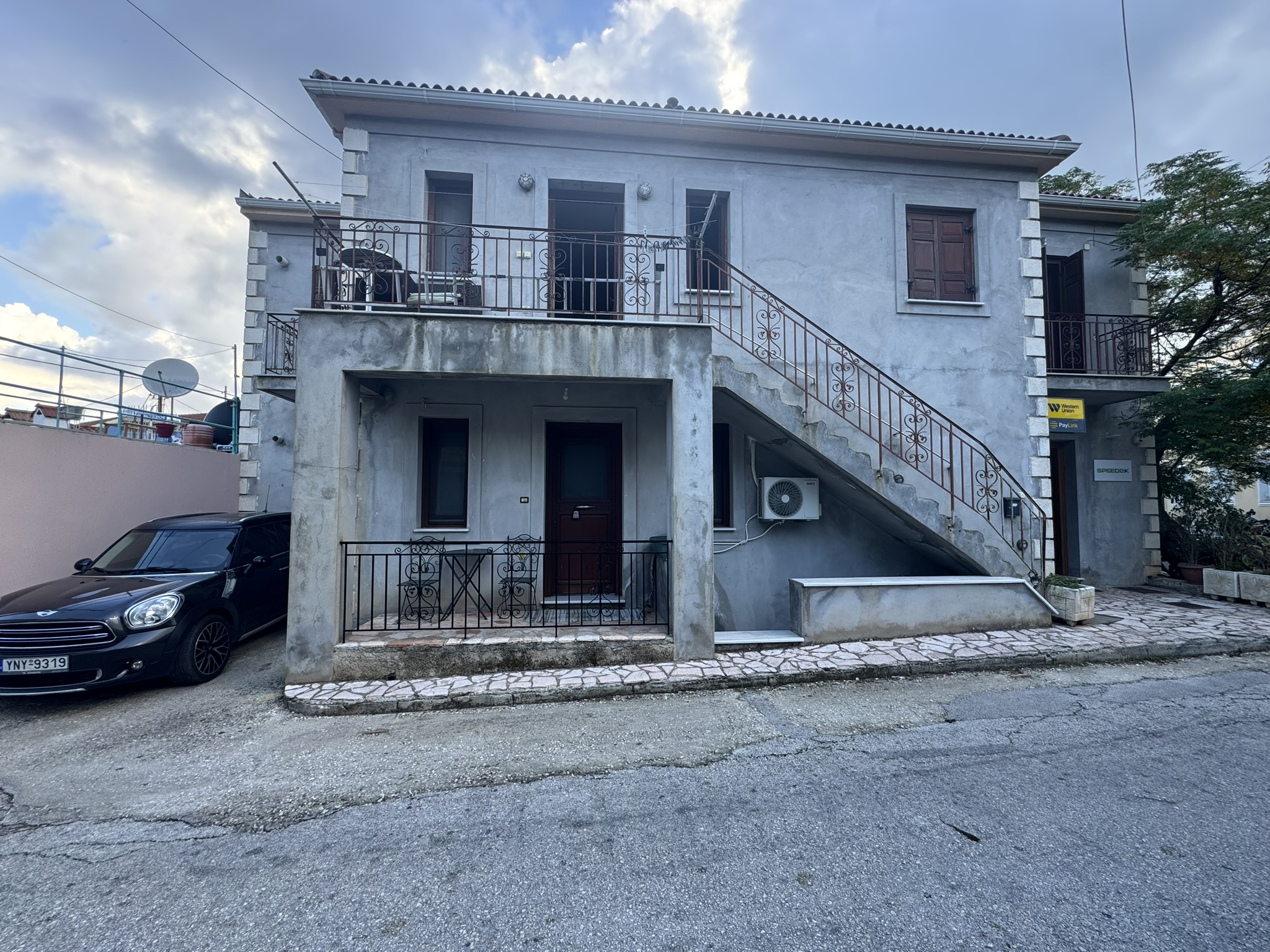 Road view of house for sale in Ithaca Greece, Vathi