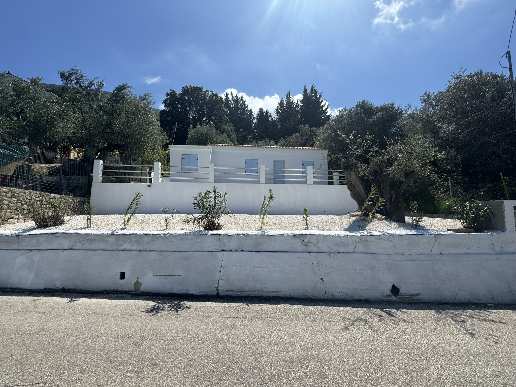 Frontal view of house for sale in Ithaca Greece, Aetos