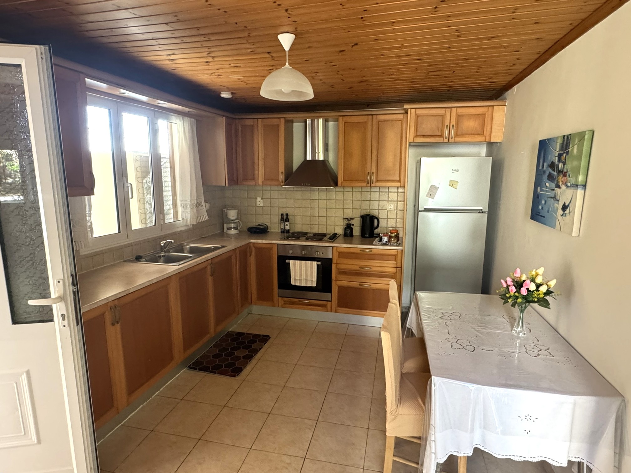 Kitchen and dining area of house for sale in Ithaca Greece Frikes