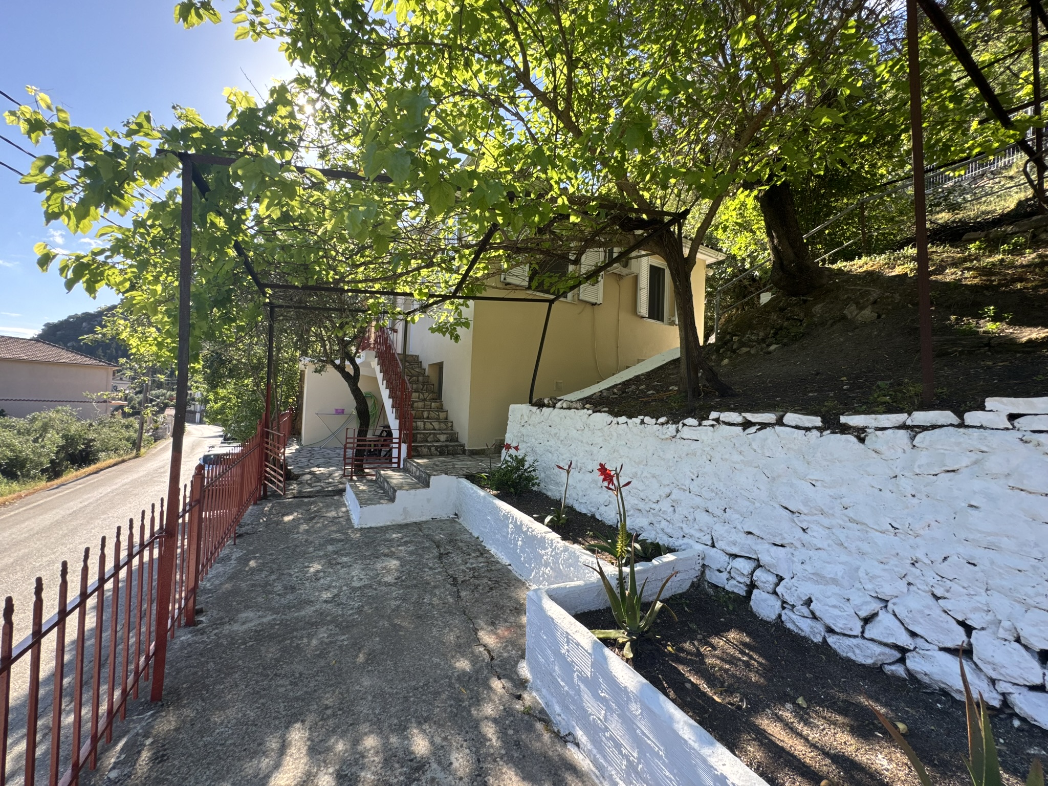 Outside area of house for sale in Ithaca Greece Frikes