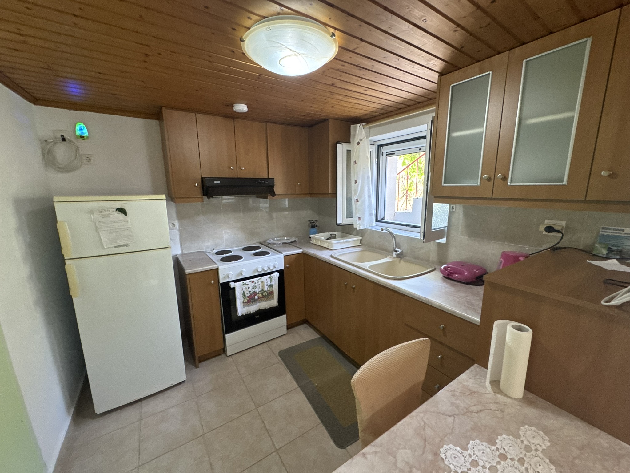 Kitchen area of house for sale in Ithaca Greece Frikes