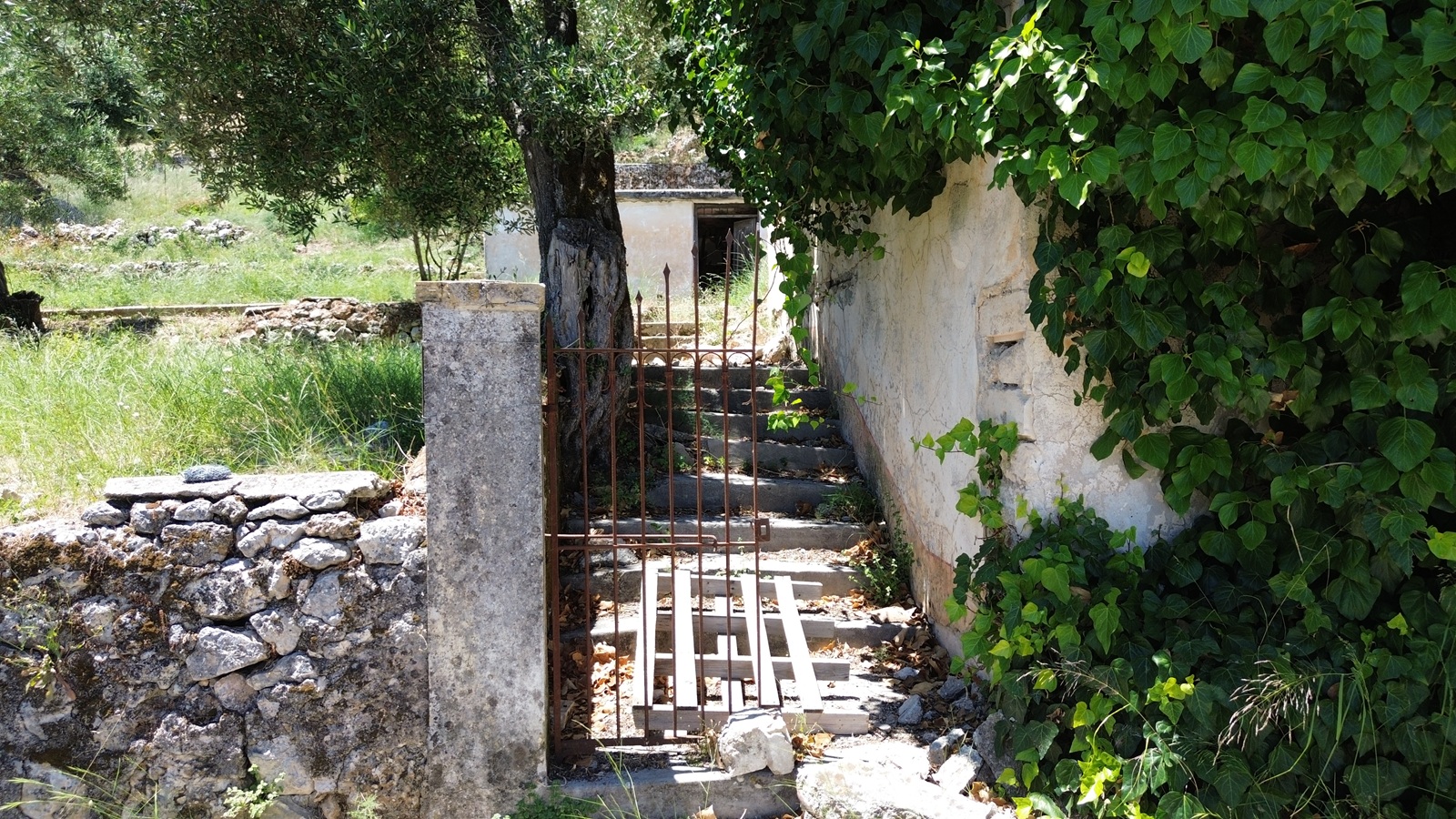 Access stairs of ruin with land for sale in Ithaca Greece, Kolleri