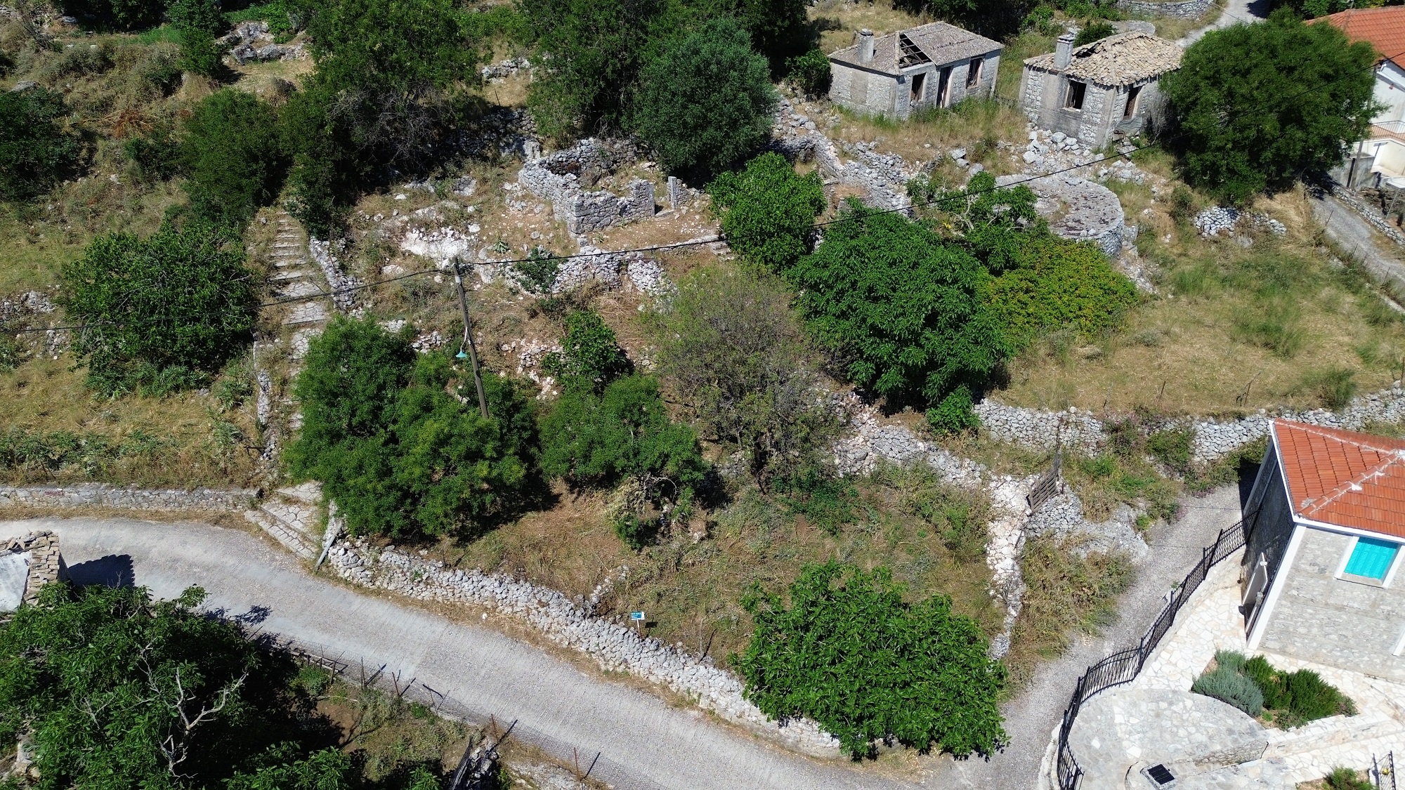 Aerial view of land with ruin for sale in Ithaca Greece, Anoghi