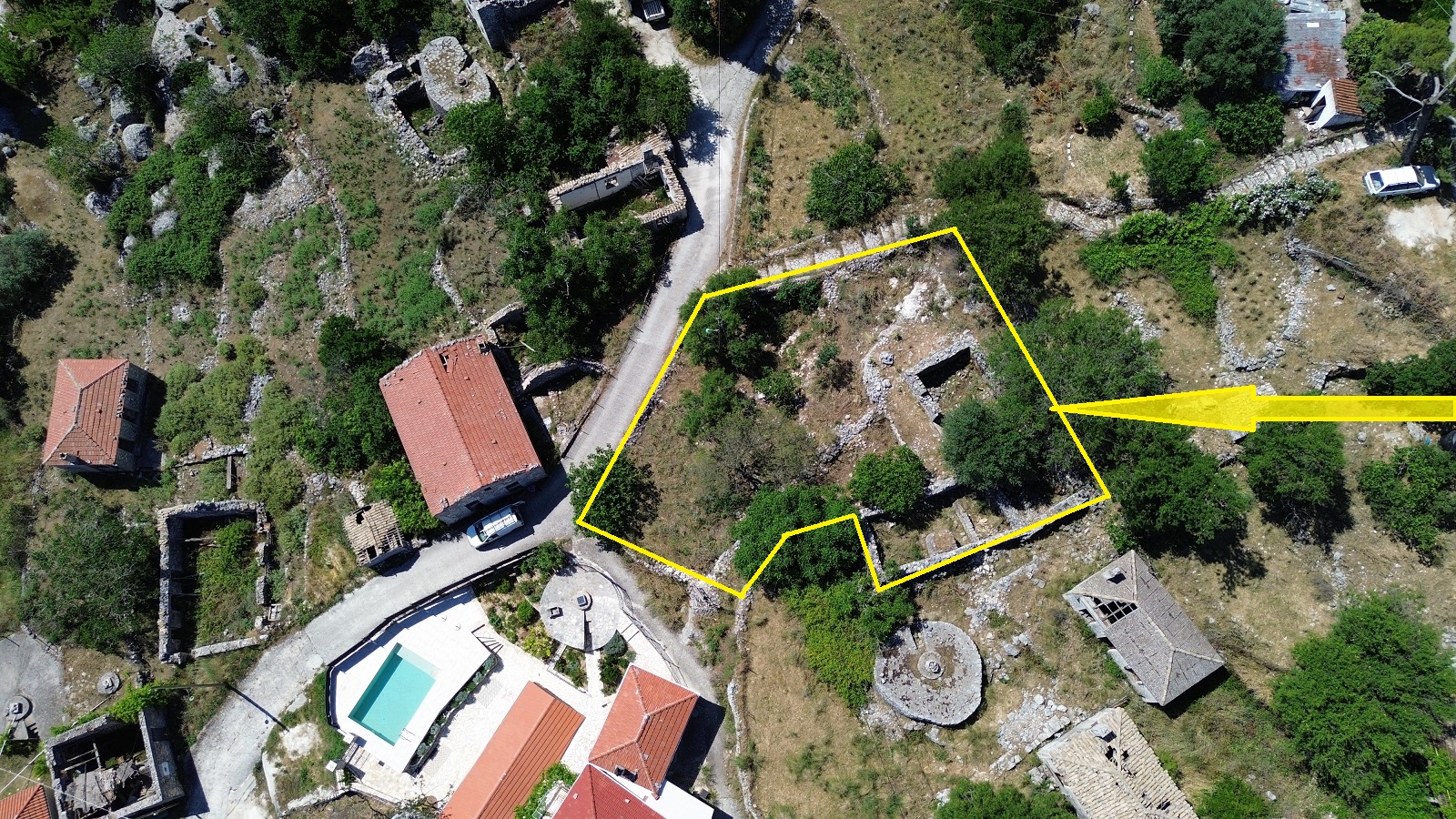 Aerial view and outlined border of land with ruin for sale in Ithaca Greece, Anoghi