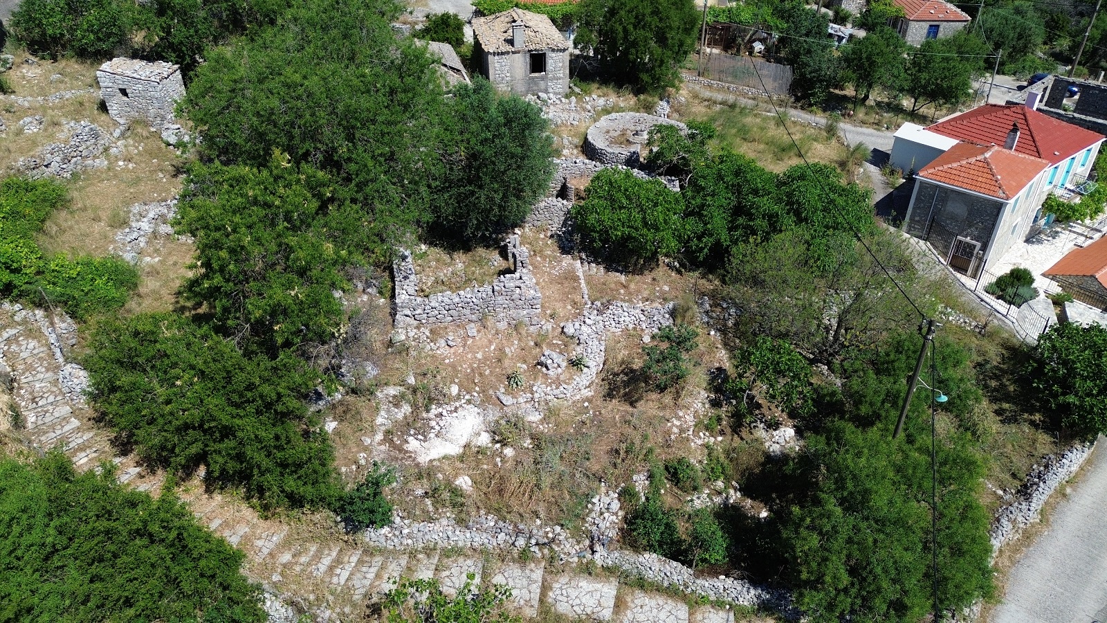 Aerial view of land with ruin for sale in Ithaca Greece, Anoghi