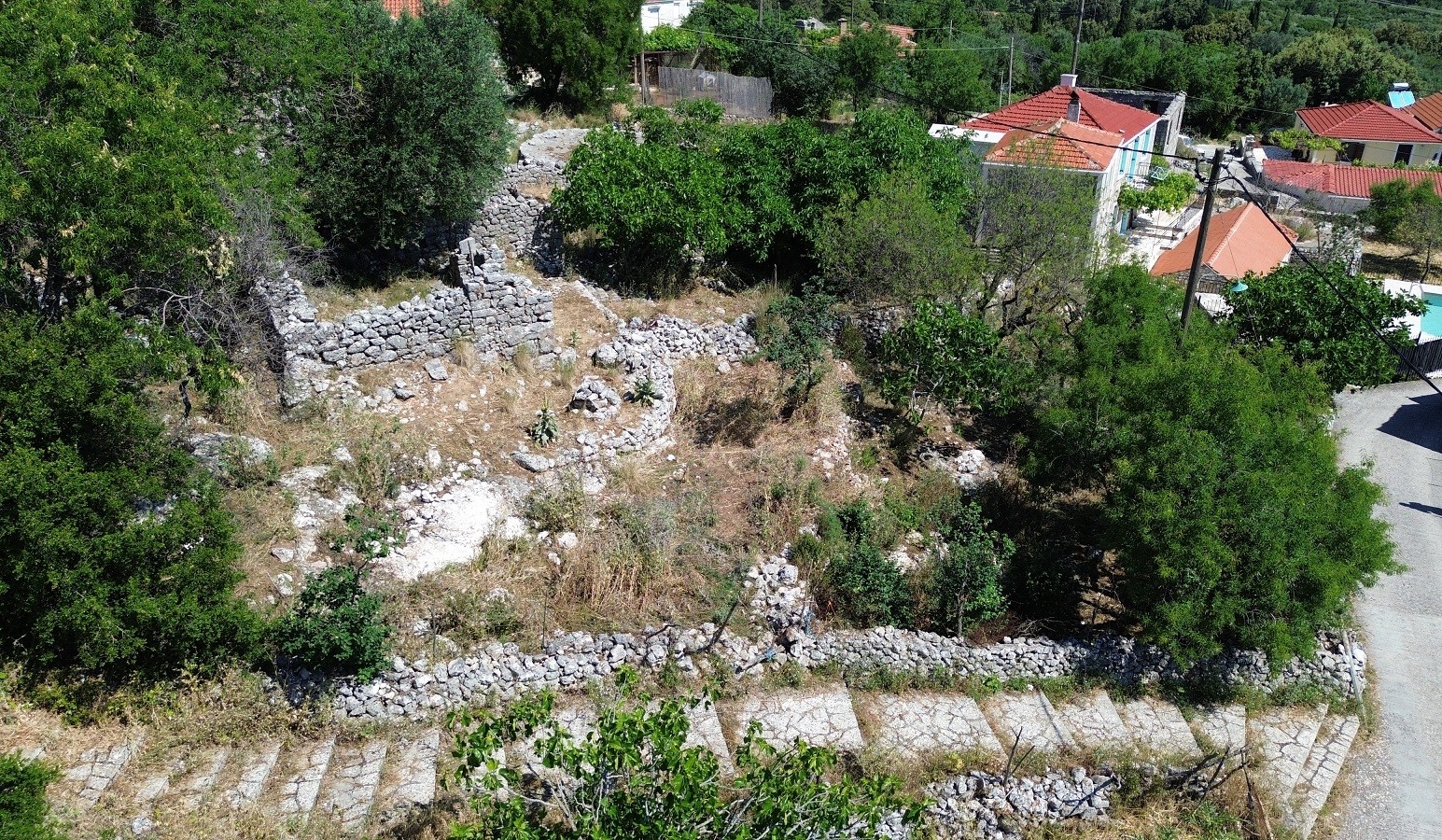 Aerial view of land with ruin for sale in Ithaca Greece, Anoghi