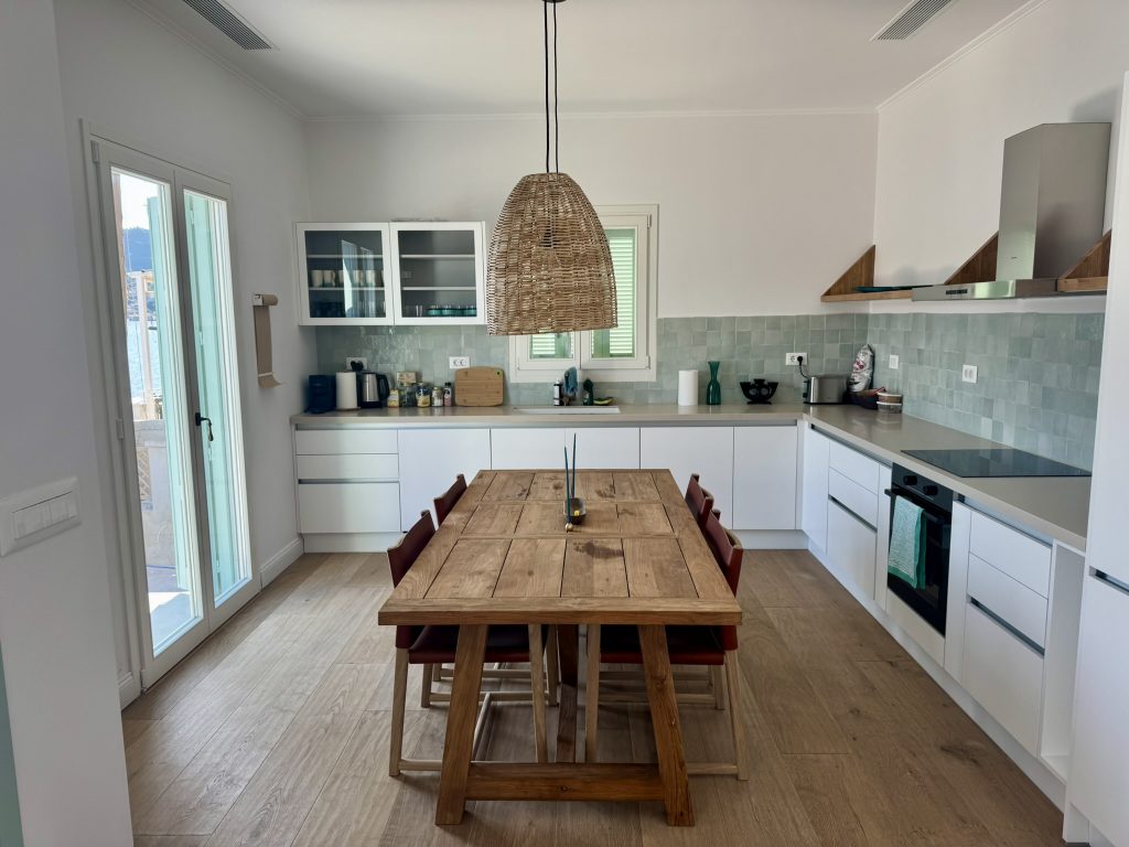 Kitchen and dining area of house renovated with project management in Ithaca Greece Vathi