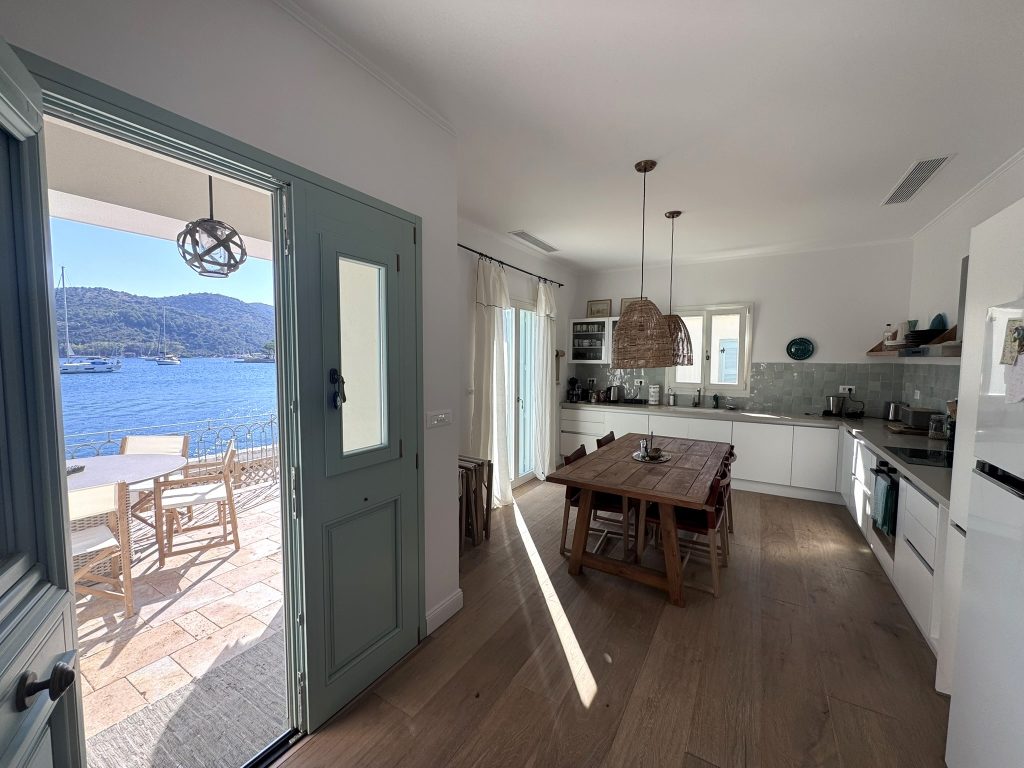 Kitchen and dining area of house renovated with project management in Ithaca Greece Vathi
