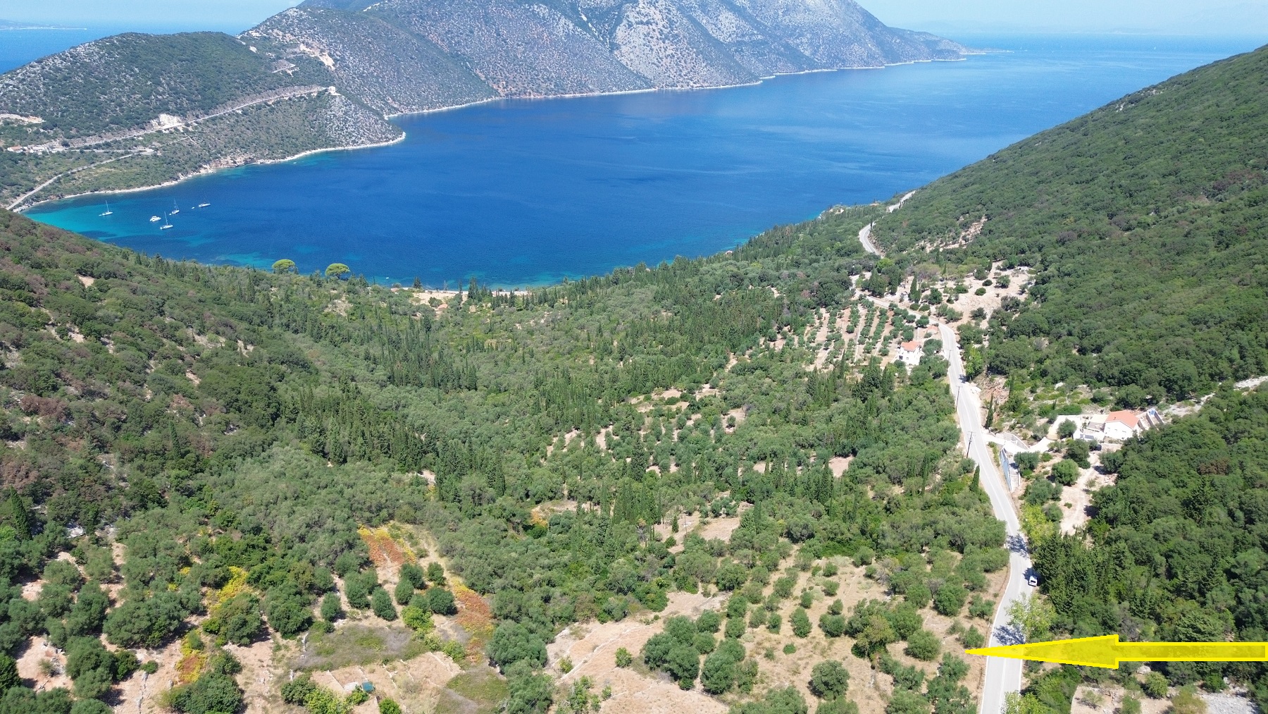 Aerial view and location of land with building license for sale in Ithaca Greece Piso Aetos