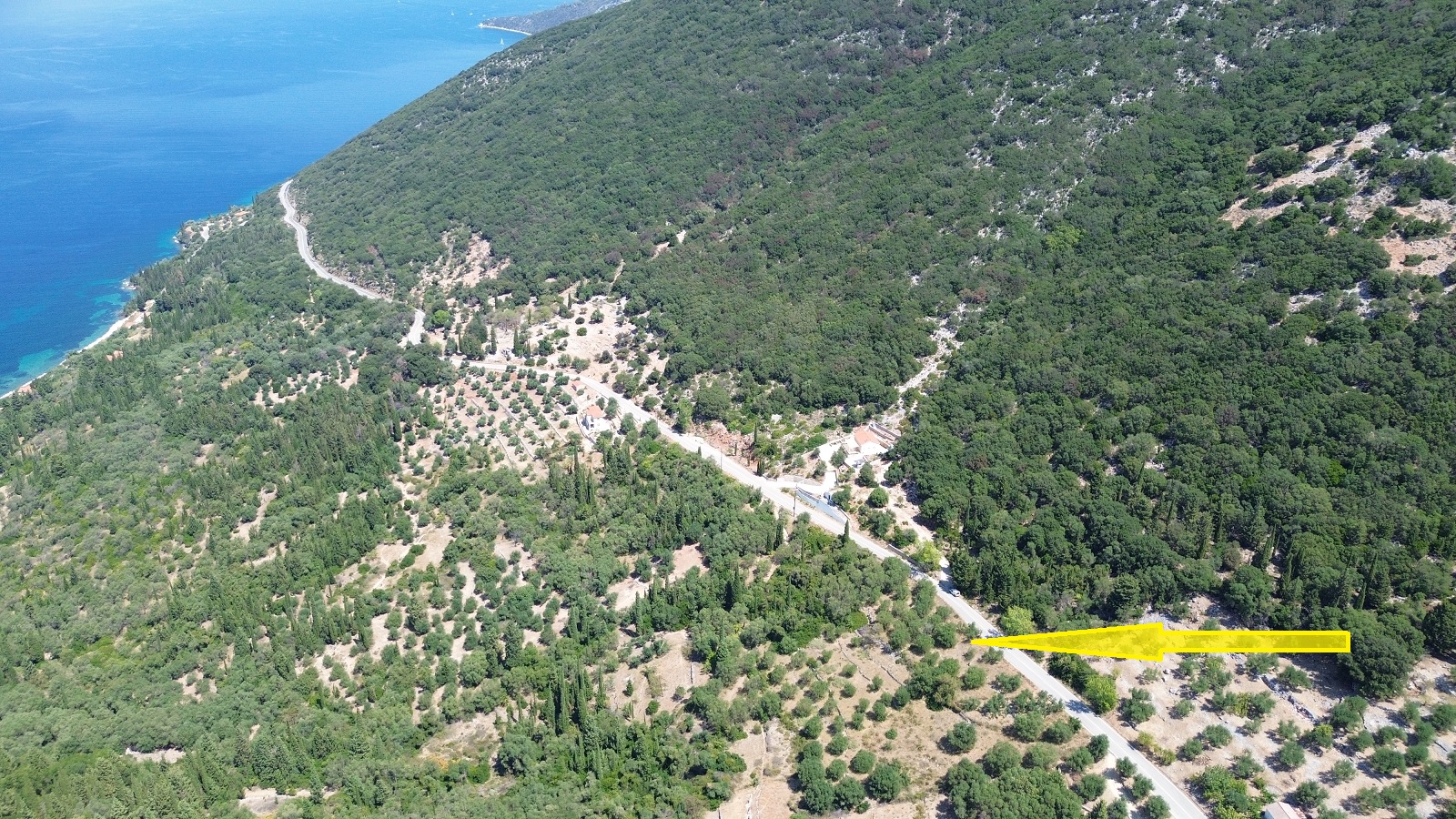 Aerial view and location of land with building license for sale in Ithaca Greece Piso Aetos