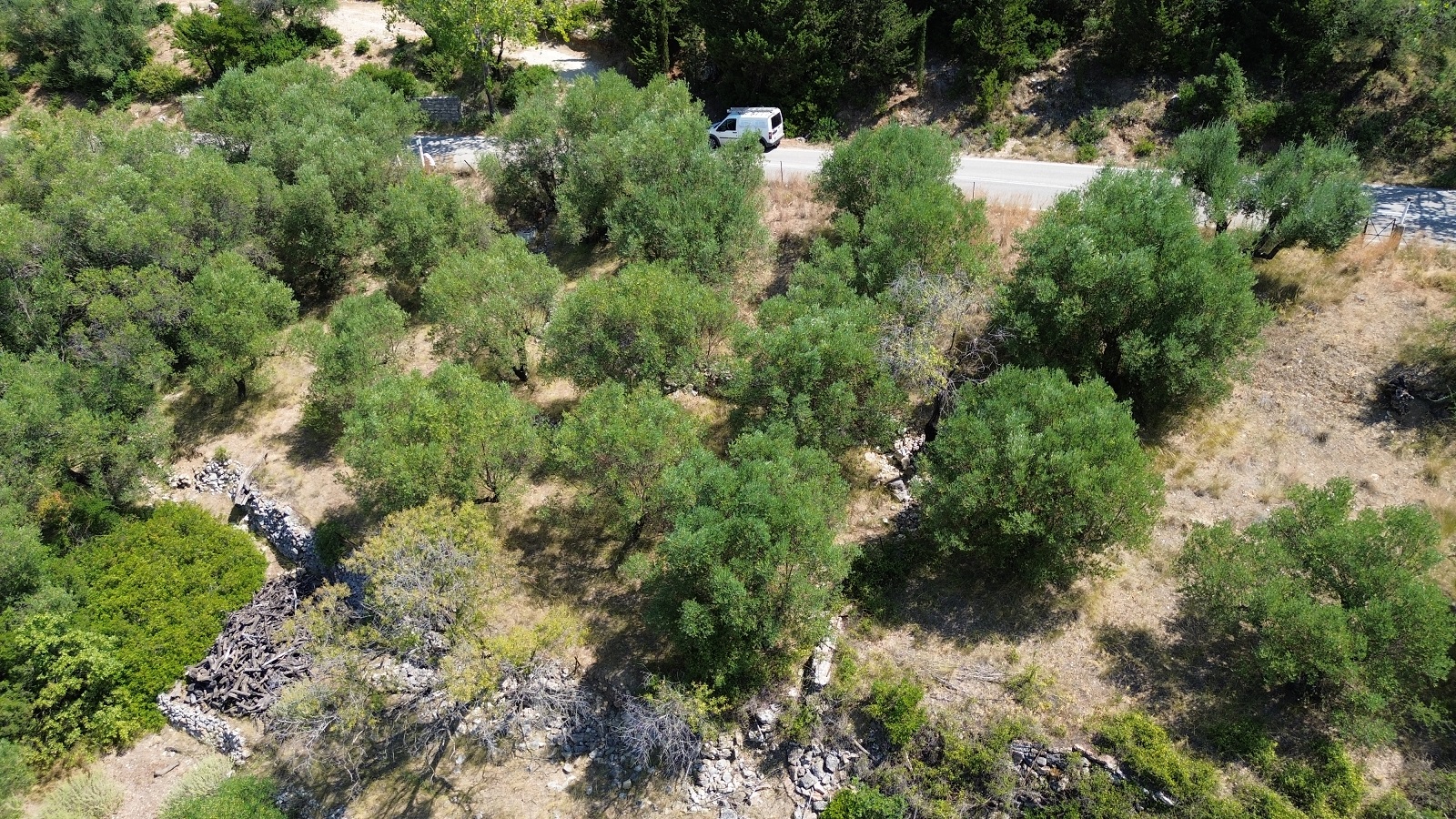 Aerial view of land with building license for sale in Ithaca Greece Piso Aetos