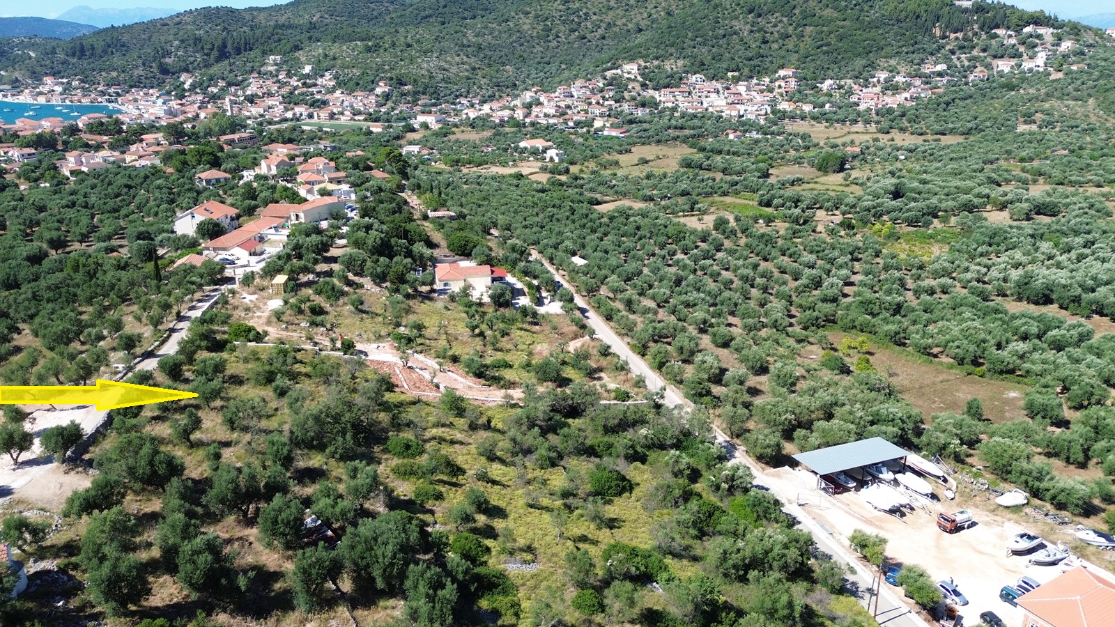Aerial view and location of land for sale in Ithaca, Greece, Vathi