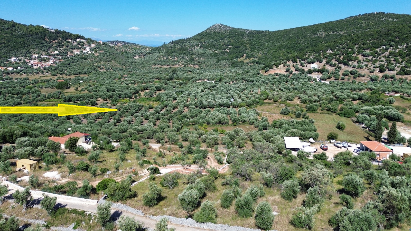 Aerial view and location of land for sale in Ithaca, Greece, Vathi