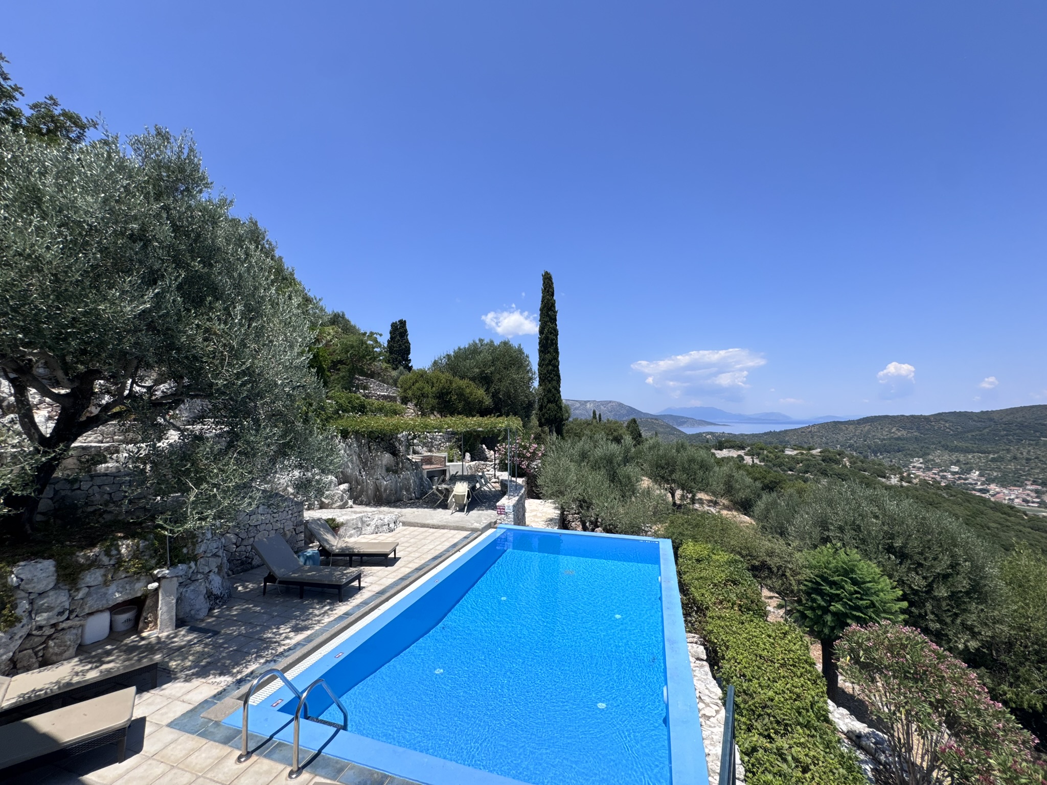 Pool area of house with pool for sale in Ithaca Greece, Perachori
