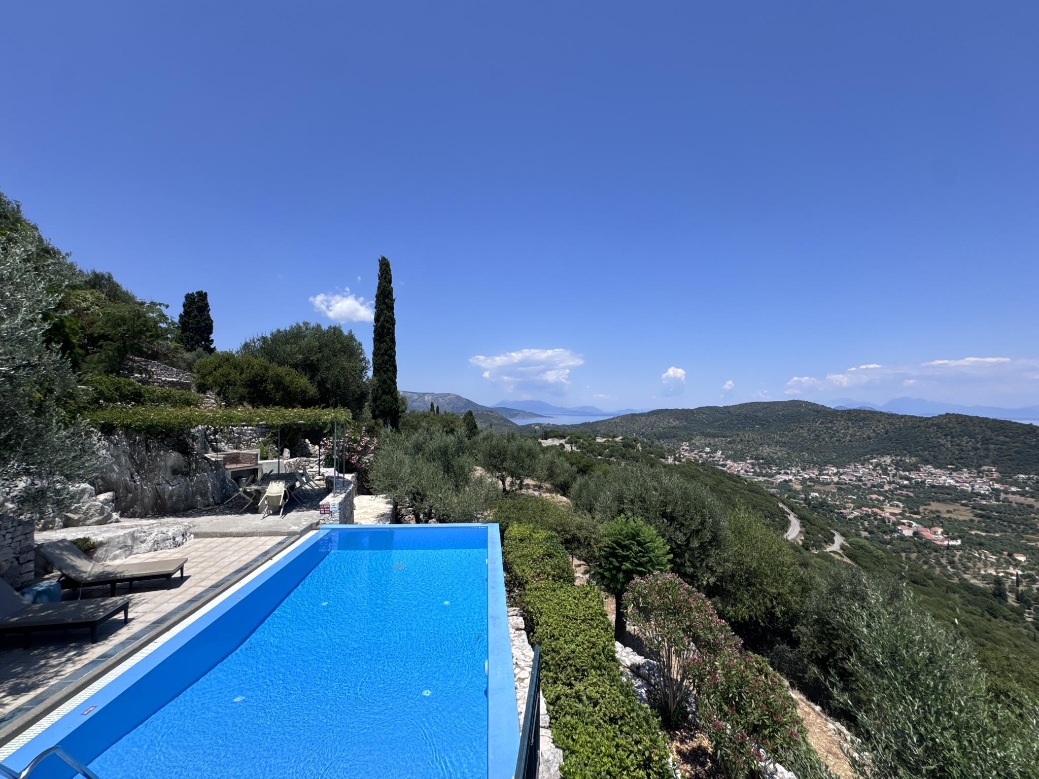 Pool area of house with pool for sale in Ithaca Greece, Perachori
