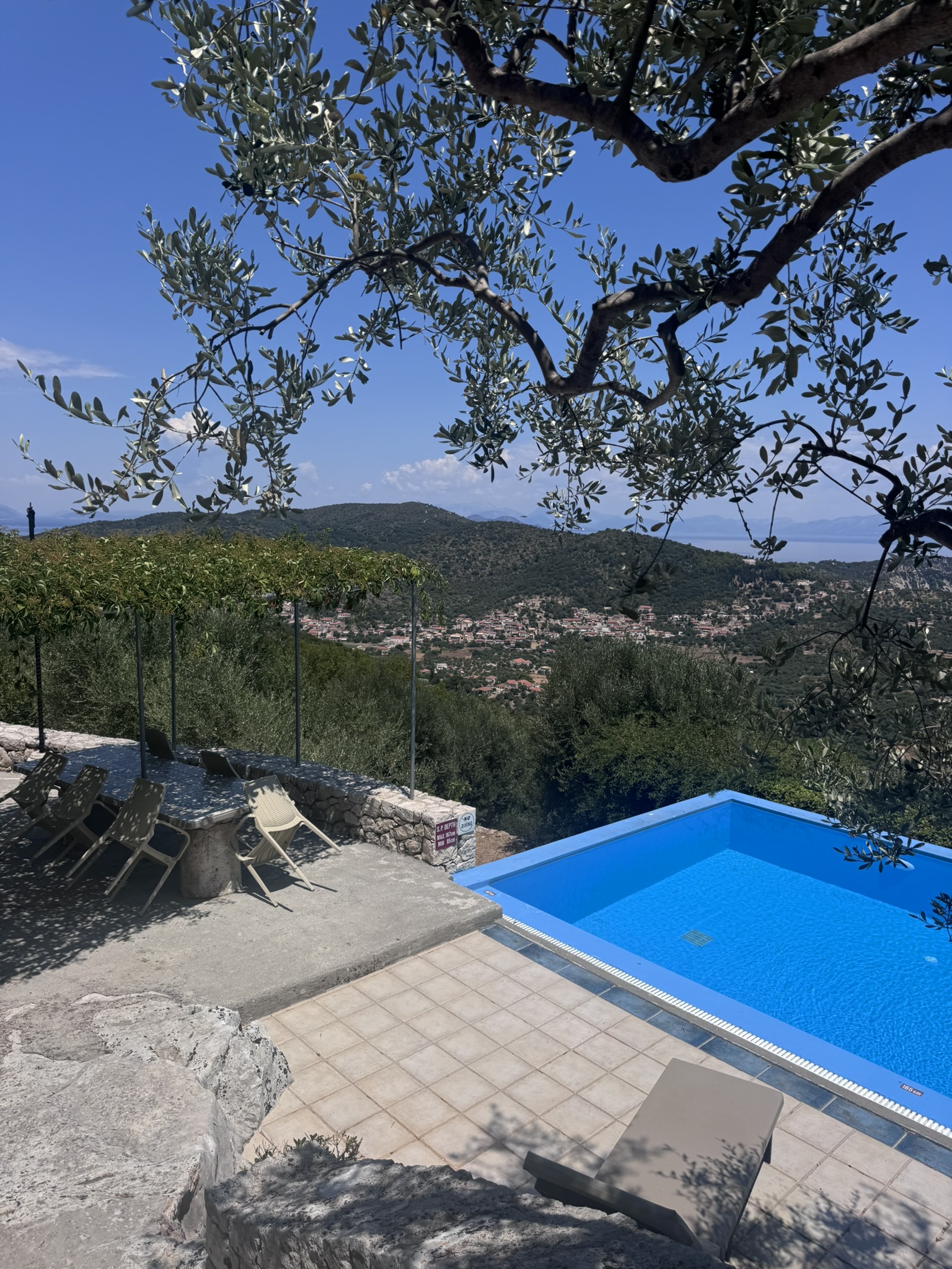 Pool area of house with pool for sale in Ithaca Greece, Perachori